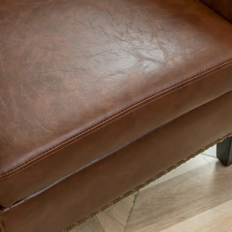 Fauteuil club KINWELL en cuir PU capitonné avec clous décoratifs
