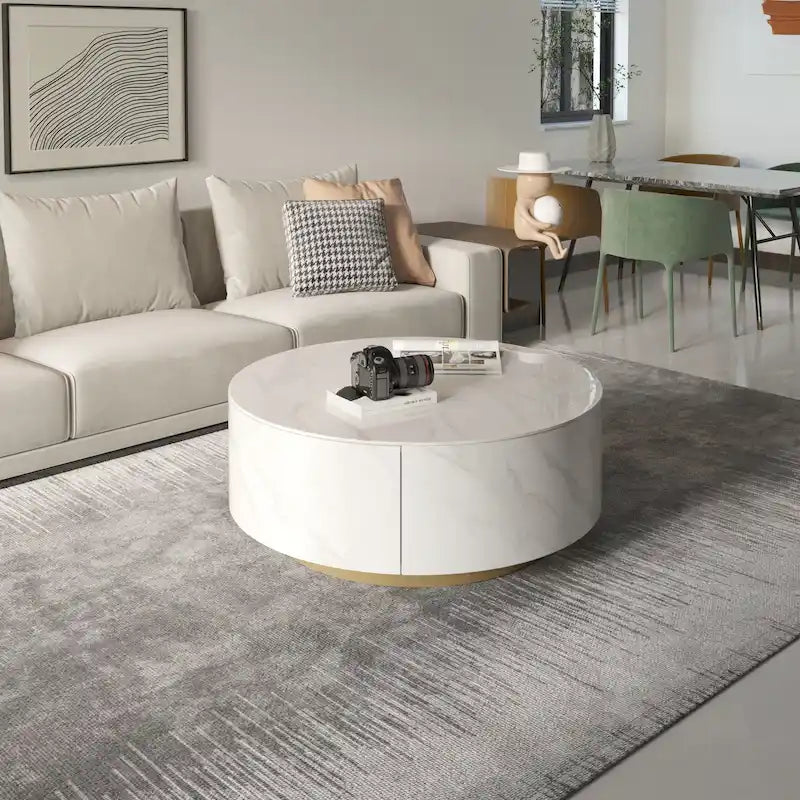 Table basse ronde moderne avec plateau en marbre, piètement en métal et 2 tiroirs