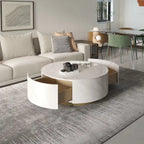 Table basse ronde moderne avec plateau en marbre, piètement en métal et 2 tiroirs
