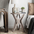 Table d'appoint ronde COZAYH, style ferme moderne, plateau vieilli et piètement assorti. Idéale pour une déco bohème ou une maison de campagne moderne.