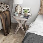 Table d'appoint ronde COZAYH, style ferme moderne, plateau vieilli et piètement assorti. Idéale pour une déco bohème ou une maison de campagne moderne.