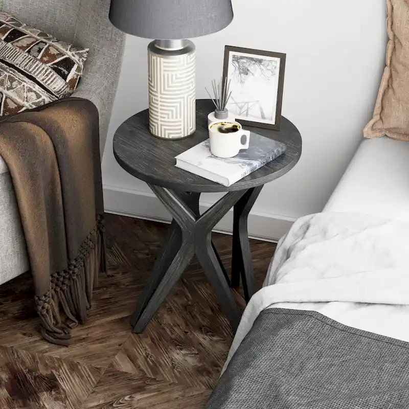 Table d'appoint ronde COZAYH, style ferme moderne, plateau vieilli et piètement assorti. Idéale pour une déco bohème ou une maison de campagne moderne.