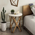 Table d'appoint ronde COZAYH, style ferme moderne, plateau vieilli et piètement assorti. Idéale pour une déco bohème ou une maison de campagne moderne.