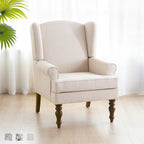 Fauteuil d'appoint avec pieds tournés et accoudoirs arrondis