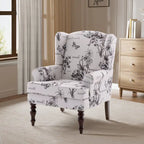 Fauteuil d'appoint avec pieds tournés et accoudoirs arrondis