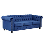 Canapé Chesterfield Morden Fort en velours, orné de clous décoratifs et doté de pieds massifs, pour salon