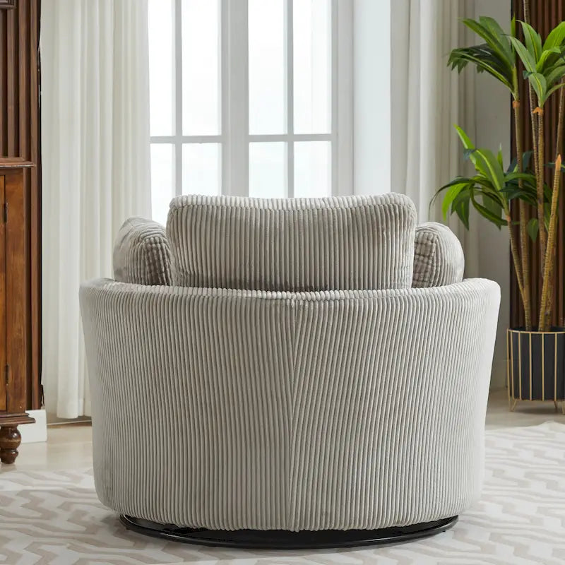 Fauteuil club pivotant rembourré avec piètement en métal