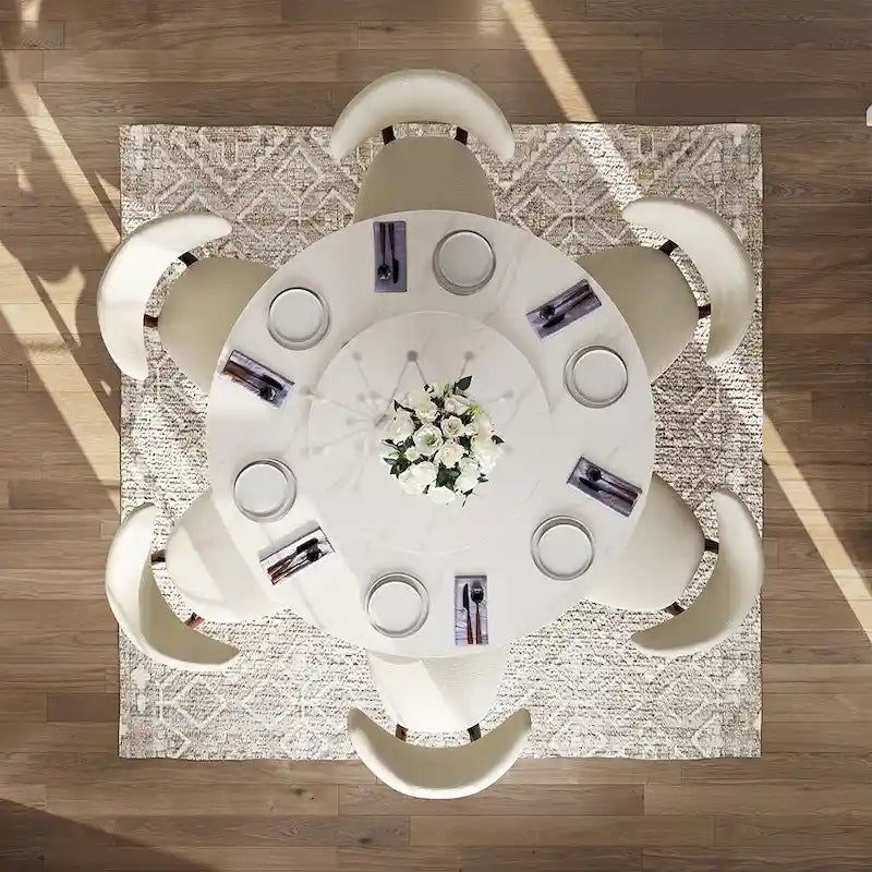 Table de salle à manger ronde blanche moderne, plateau en pierre frittée, piètement en acier au carbone noir massif