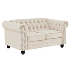 Canapé Chesterfield deux places Morden Fort en velours, capitonné, clouté et pieds massifs, idéal pour le salon.