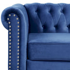 Canapé Chesterfield deux places Morden Fort en velours, capitonné, clouté et pieds massifs, idéal pour le salon.