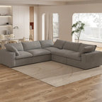 Grand canapé d'angle rembourré de duvet avec pouf pour salon