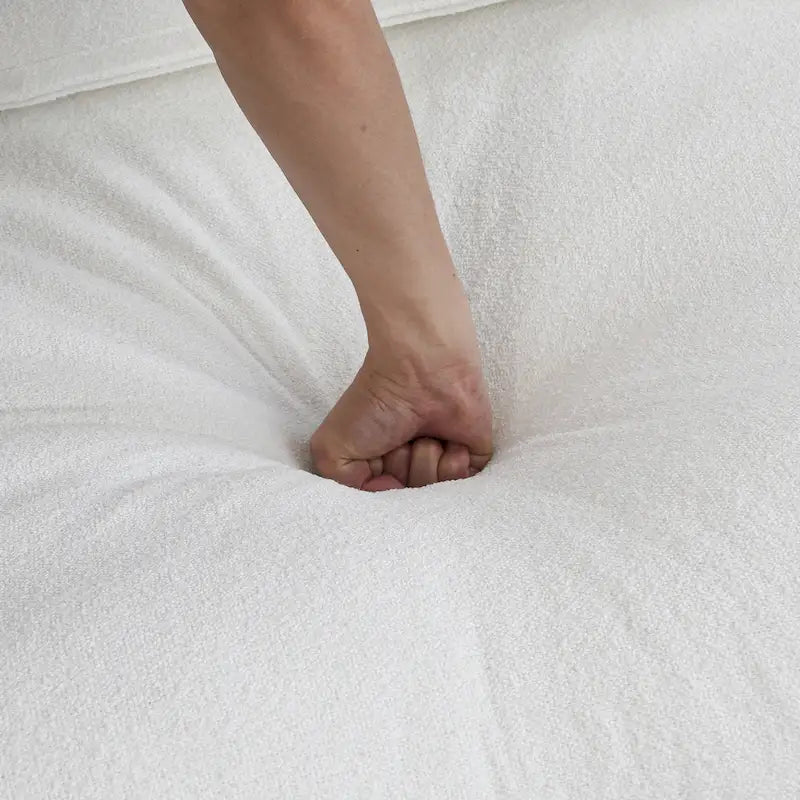Grand canapé d'angle rembourré de duvet avec pouf pour salon