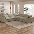 Grand canapé d'angle rembourré de duvet avec pouf pour salon
