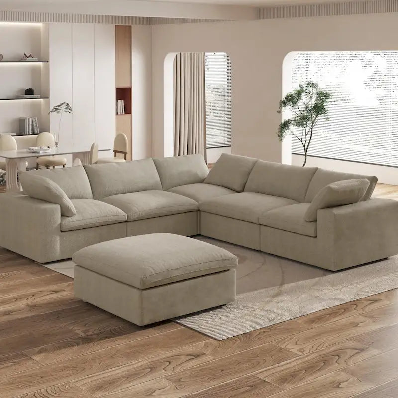 Grand canapé d'angle rembourré de duvet avec pouf pour salon