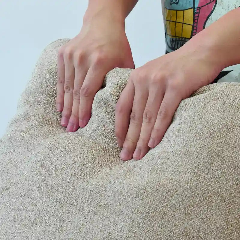 Grand canapé d'angle rembourré de duvet avec pouf pour salon