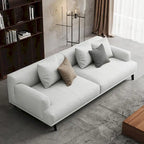 Canapé droit en tissu beige avec accoudoirs carrés