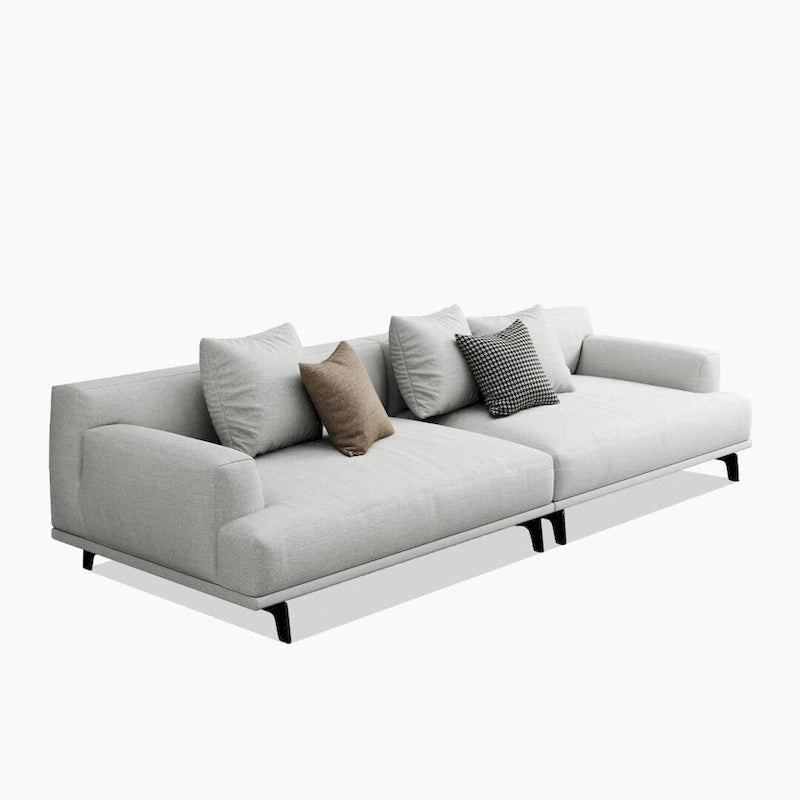 Canapé droit en tissu beige avec accoudoirs carrés