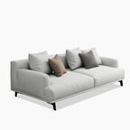 Canapé droit en tissu beige avec accoudoirs carrés