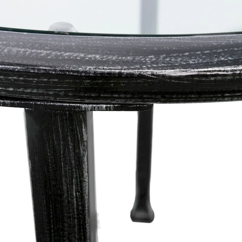 Table d'appoint ronde Glenn de SEI Furniture, en métal noir vieilli, avec plateau en verre et étagère.