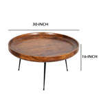 Table basse ronde Gia en bois de manguier avec pieds en métal évasés, marron et noir