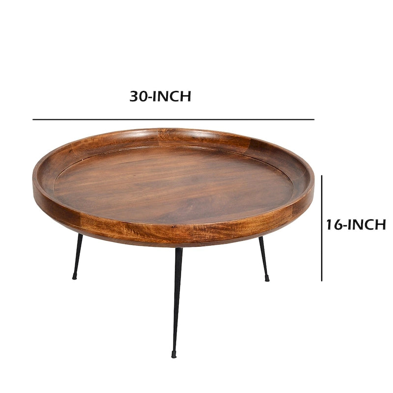 Table basse ronde Gia en bois de manguier avec pieds en métal évasés, marron et noir