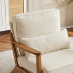 Fauteuil d'appoint beige en lin mélangé, pieds en bois et un coussin.