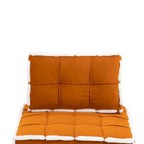 Fauteuil relax d'appoint une place, profond et sans accoudoirs, avec assise rembourrée.