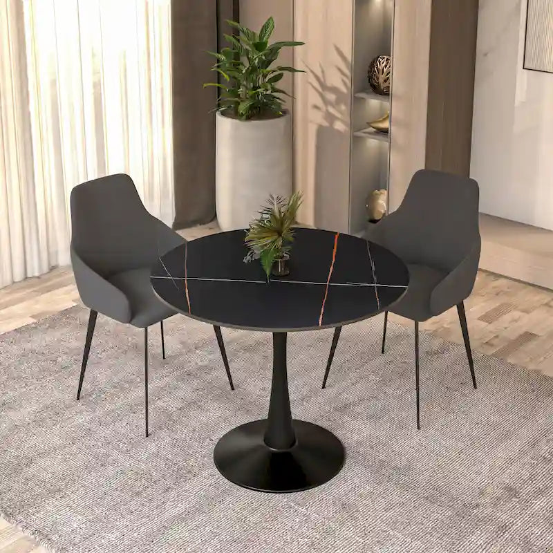 Table de salle à manger ronde Bristol 35 pour 4 personnes avec plateau en pierre frittée et piètement noir, idéale pour la cuisine et la salle à manger.