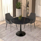 Table de salle à manger ronde Bristol 35 pour 4 personnes avec plateau en pierre frittée et piètement noir, idéale pour la cuisine et la salle à manger.