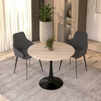 Table de salle à manger ronde Bristol 35 pour 4 personnes avec plateau en pierre frittée et piètement noir, idéale pour la cuisine et la salle à manger.