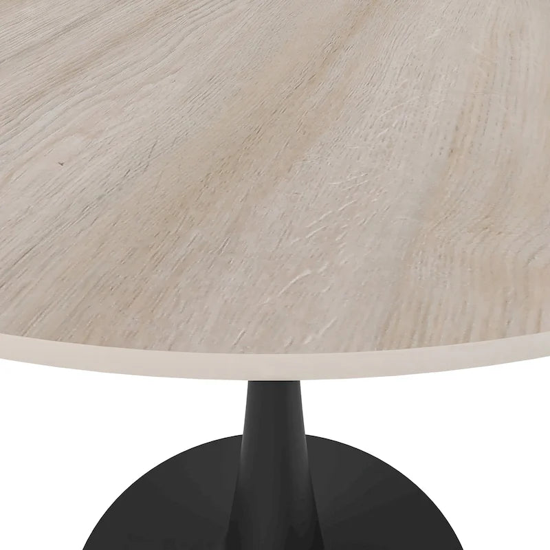 Table de salle à manger ronde Bristol 35 pour 4 personnes avec plateau en pierre frittée et piètement noir, idéale pour la cuisine et la salle à manger.