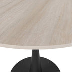 Table de salle à manger ronde Bristol 35 pour 4 personnes avec plateau en pierre frittée et piètement noir, idéale pour la cuisine et la salle à manger.