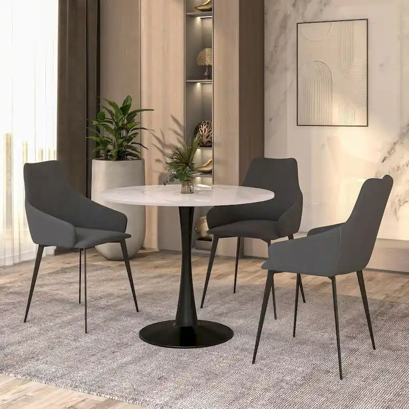 Table de salle à manger ronde Bristol 35 pour 4 personnes avec plateau en pierre frittée et piètement noir, idéale pour la cuisine et la salle à manger.