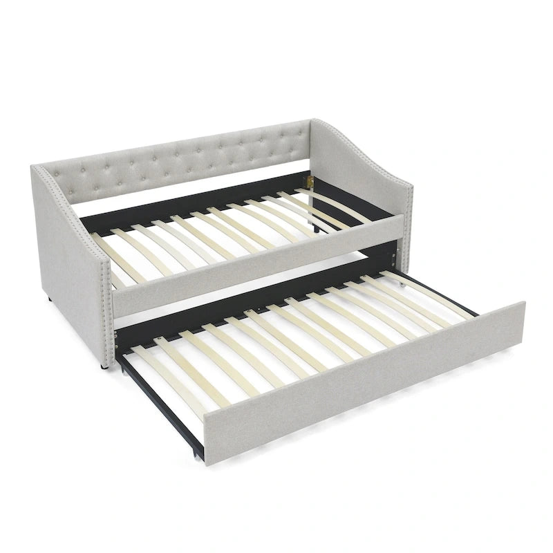 Lit de jour une place avec lit gigogne une place, canapé-lit capitonné et rembourré, avec bouton au dos et clous en cuivre sur les accoudoirs ondulés